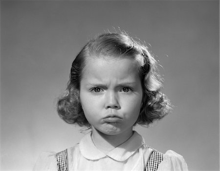 pouting - 1950s PORTRAIT SAD SERIOUS GIRL MAKING GRUMPY ANGRY POUTING FACIAL EXPRESSION Stock Photo - Rights-Managed, Code: 846-02793722