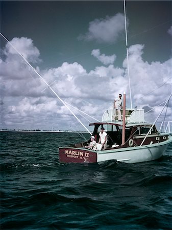 deep sea - ANNÉES 1950 3 HOMMES SUR LE BATEAU DE PÊCHE AFFRÉTÉ MARLIN II FREEPORT NEW YORK SPORT FISH Photographie de stock - Rights-Managed, Code: 846-02793821