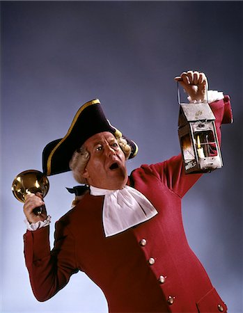 MAN TOWN CRIER 18TH CENTURY COLONIAL COSTUME RINGING BELL SHOUTING NEWS HOLDING LANTERN Stock Photo - Rights-Managed, Code: 846-03164043