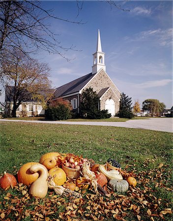 1960s AUTUMN STONE CHURCH WITH HARVEST BASKET IN FOREGROUND Stock Photo - Rights-Managed, Code: 846-03164056