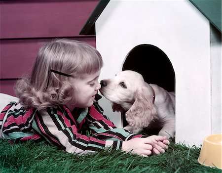 retro child dog - 1970s GIRL PUPPY KISS DOG HOUSE Stock Photo - Rights-Managed, Code: 846-03164139