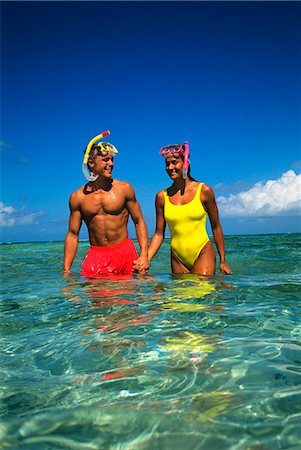 snorkeling - COUPLE AVEC MASQUES DE PLONGÉE EN APNÉE, DEBOUT DANS LA CUISSE PROFONDE EAU TOBAGO CAYS, WEST INDIES Photographie de stock - Rights-Managed, Code: 846-03164145