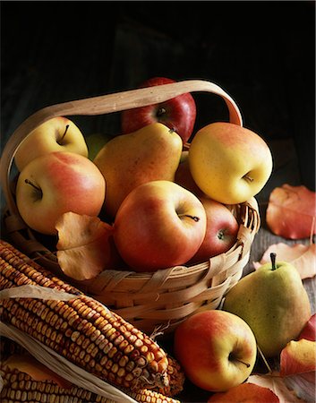 seasonal - AUTUMN HARVEST STILL LIFE APPLES PEARS IN SPLIT OAK BASKET ARRANGED WITH INDIAN CORN Stock Photo - Rights-Managed, Code: 846-03164569