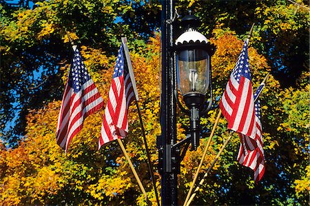 small towns in the fall - FOUR AMERICAN FLAGS ON STREET LIGHT Stock Photo - Rights-Managed, Code: 846-03164579