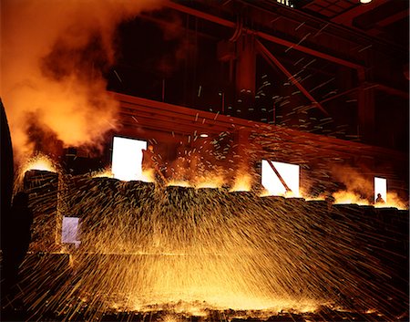 sparks of molten metal - SPARKS OF MOLTEN METAL IN STEEL MILL ALAN WOOD STEEL COMPANY CONSHOHOCKEN PA Stock Photo - Rights-Managed, Code: 846-03164709