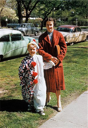 simsearch:846-03166353,k - 1950s MOTHER WITH SON DRESSED IN CLOWN SUIT OUTDOORS Stock Photo - Rights-Managed, Code: 846-03164803