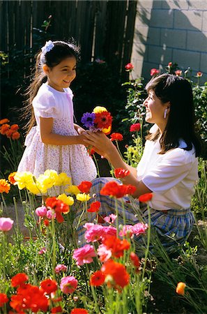 MOTHER IN GARDEN WITH DAUGHTER Stock Photo - Rights-Managed, Code: 846-03164871