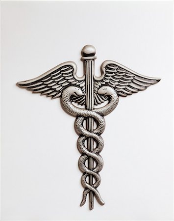 CADUCEUS AN INSIGNIA OF HERMES WINGED STAFF TWINED WITH SERPENTS NOW THE SYMBOL OF THE MEDICAL PROFESSION Stock Photo - Rights-Managed, Code: 846-03165000