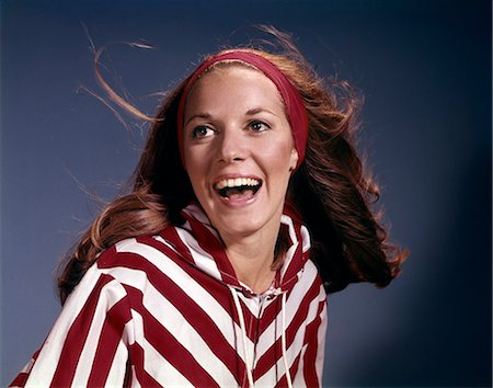 1960s PORTRAIT SMILING LAUGHING WOMAN RED HEADBAND STRIPED JACKET Stock Photo - Rights-Managed, Code: 846-03165236