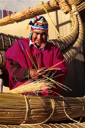 south american indian man - BOLIVIA LAKE TITICACA AYMARA INDIAN MAN BUILDING REED BOAT Stock Photo - Rights-Managed, Code: 846-03165333