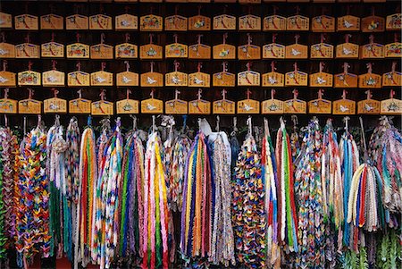 prayer tablets - PRAYER TABLETS AND RIBBONS AT FUSHIMI INARI SHINTO SHRINE KYOTO JAPAN Stock Photo - Rights-Managed, Code: 846-03165555