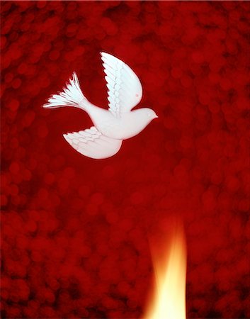 SYMBOLIQUE DE LA PENTECÔTE DOVE ET DE FLAMME SUR FOND ROUGE Photographie de stock - Rights-Managed, Code: 846-03165624