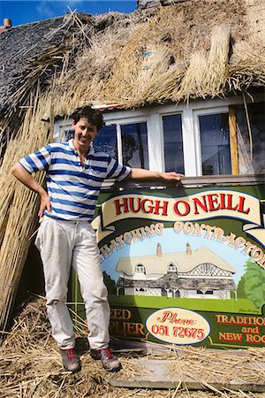 rural irish people - IRISH MAN THATCHER STANDING IN FRONT OF SIGN DUNMORE EAST, COUNTY WATERFORD IRELAND Stock Photo - Rights-Managed, Code: 846-03165738