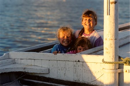 THREE SMILING GIRLS FISHING BOAT COUNTY DONEGAL IRELAND Stock Photo - Rights-Managed, Code: 846-03165741