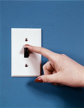 1970s FEMALE HAND WITH FINGER FLIPPING OFF LIGHT SWITCH Stock Photo - Rights-Managed, Code: 846-03165824