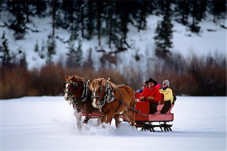 retro woman with christmas - 1990s PEOPLE RIDING HORSE DRAWN SLEIGH GRANBY COLORADO USA Stock Photo - Rights-Managed, Code: 846-03166153