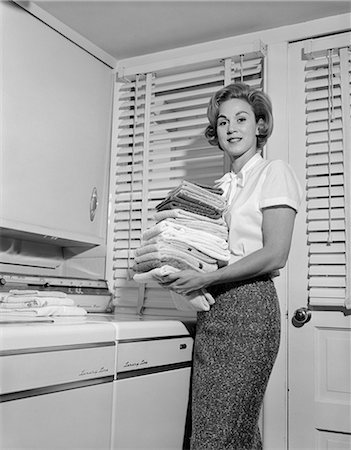 Woman behind a huge pair of underwear on a clothesline Stock Photo