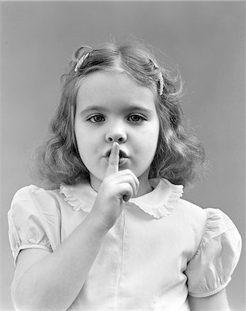 CHILD WITH FINGER TO LIPS QUIET Stock Photo - Rights-Managed, Code: 846-03163386
