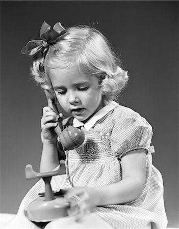 person talking old fashioned phone - 1940s CHILD TALKING ON PHONE Stock Photo - Rights-Managed, Code: 846-03163390