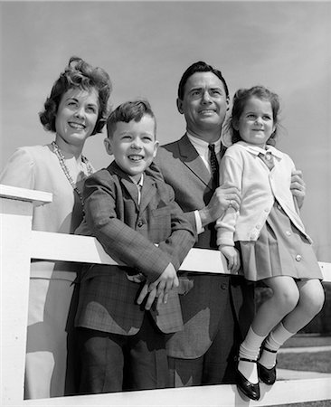 family outdoors black and white - 1960s FAMILY POSING ON FENCE SMILING Stock Photo - Rights-Managed, Code: 846-03163419