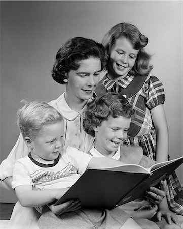 1950s FAMILY LOOKING AT BOOK Stock Photo - Rights-Managed, Code: 846-03163552