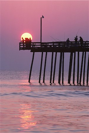 SUNRISE AT OUTER BANKS FISHING PIER BODIE ISLAND, NORTH CAROLINA OUTER BANKS, BARRIER ISLAND Stock Photo - Rights-Managed, Code: 846-03163669