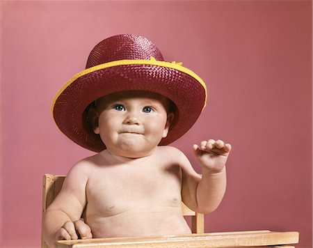 retro baby hat - 1960s BABY MAKING FACE WEARING RED STRAW HAT Stock Photo - Rights-Managed, Code: 846-03163955