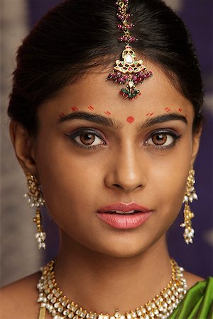 South Asian Indian Costume Decoration On The Face Stock Photos