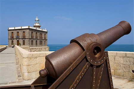 feux clignotants - Phare et l'artillerie, District de Medina Sidonia (vieille ville), Melilla, Espagne, espagnol en Afrique du Nord, Afrique Photographie de stock - Rights-Managed, Code: 841-05784410