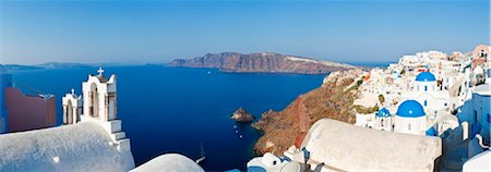 Blue domed churches in the village of Oia, Santorini (Thira), Cyclades Islands, Aegean Sea, Greek Islands, Greece, Europe Stock Photo - Rights-Managed, Code: 841-05784795