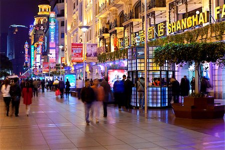 retail shopping street exterior - Pedestrians at night walking past stores on Nanjing Road, Shanghai, China, Asia Stock Photo - Rights-Managed, Code: 841-05784809