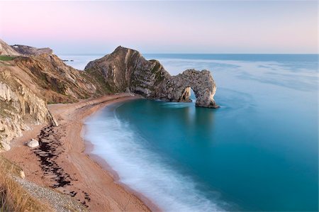 Plage déserte au crépuscule en hiver, Durdle Door, Côte Jurassique, patrimoine mondial de l'UNESCO, Dorset, Angleterre, Royaume-Uni, Europe Photographie de stock - Rights-Managed, Code: 841-05785199