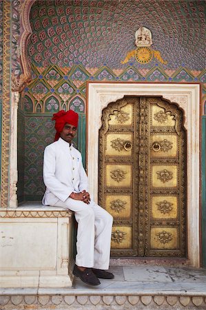 rajasthan historical places - Palace guard sitting at Rose Gate in Pitam Niwas Chowk, City Palace, Jaipur, Rajasthan, India, Asia Stock Photo - Rights-Managed, Code: 841-05785326