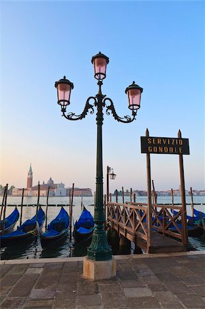 san giorgio maggiore - Gondolas moored by Riva degli Schiavoni, looking towards San Giorgio Maggiore, Venice, UNESCO World Heritage Site, Veneto, Italy, Europe Fotografie stock - Rights-Managed, Codice: 841-05785602