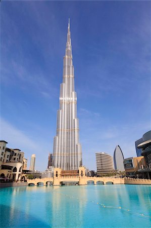 dubai big building photos - Burj Khalifa, the tallest man made structure in the world at 828 metres, and Dubai Mall, Downtown Dubai, Dubai, United Arab Emirates, Middle East Stock Photo - Rights-Managed, Code: 841-05785691