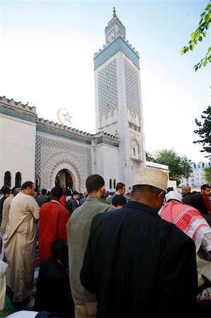 Muslims praying outside the Paris Great Mosque on Aid El-Fitr festival, Paris, France, Europe Stock Photo - Rights-Managed, Code: 841-05785777