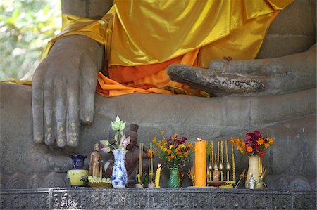 siem reap - Buddha statue in earth-touching pose, with offerings, Siem Reap, Cambodia, Indochina, Southeast Asia, Asia Stock Photo - Rights-Managed, Code: 841-05785927