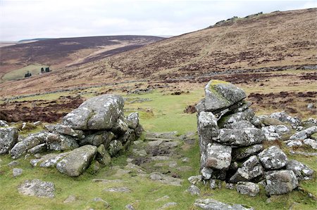 prehistórico - Granite rocks forming the entrance of Grimspound, a Bronze Age camp 3500 years old, Dartmoor, Devon, England, United Kingdom, Europe Foto de stock - Con derechos protegidos, Código: 841-05781091