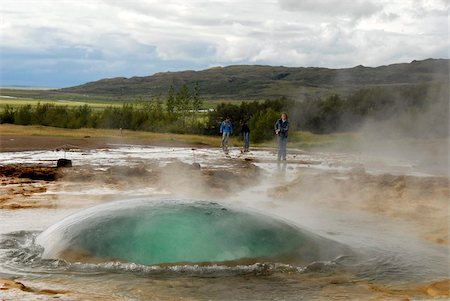 Strokkur, the unique dome of water that rises at the start of each powerful eruption of the geyser that erupts every 10 minutes, beside the now-inactive Geysir, southeast Iceland, Iceland, Polar Regions Stock Photo - Rights-Managed, Code: 841-05781181