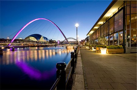 england city night - View along Newcastle Quayside at night showing the River Tyne, the floodlit Gateshead Millennium Bridge, the Arched Bridge and the Sage Gateshead, Newcastle-upon-Tyne, Tyne and Wear, England, United Kingdom, Europe Stock Photo - Rights-Managed, Code: 841-05781271