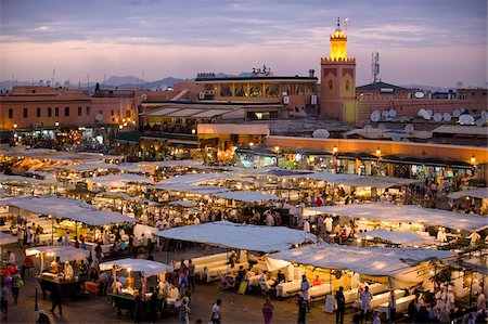 View over Djemaa el Fna at dusk with foodstalls that are set-up daily to serve tourists and locals, Marrakech, Morocco, North Africa, Africa Stock Photo - Rights-Managed, Code: 841-05781328