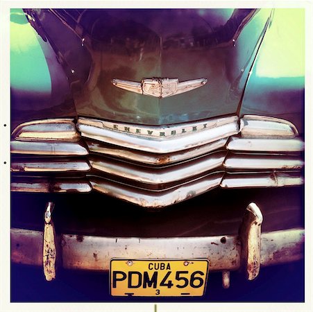Detail of the front of an old green Chevrelet showing the chrome grill and numberplate, Vinales, Cuba, West Indies, Central America Stock Photo - Rights-Managed, Code: 841-05781360