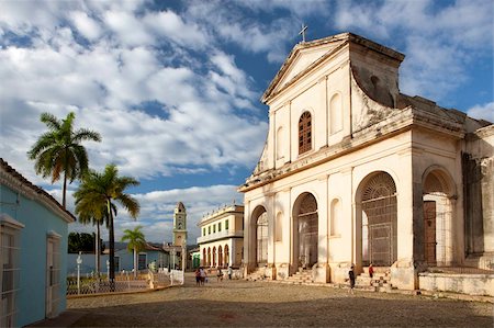 View across Plaza Mayor towards Iglesia de la Santisima Trinidad, the Museo Romantico and the tower of Iglesia y Convento de San Francisco, Trinidad, UNESCO World Heritage Site, Cuba, West Indies, Central America Stock Photo - Rights-Managed, Code: 841-05781389