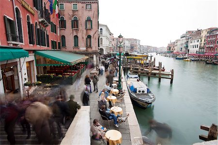 Tourists, pedestrians and cafes beside Rialto Bridge, Venice, UNESCO World Heritage Site, Veneto, Italy, Europe Stock Photo - Rights-Managed, Code: 841-05781557