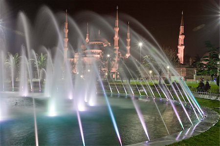 sultanahmet mosque - Coloured fountains at night in Sultan Ahmet Park, a favourite gathering place for locals and tourists, looking towards the Blue Mosque, Istanbul, Turkey, Europe Stock Photo - Rights-Managed, Code: 841-05781571