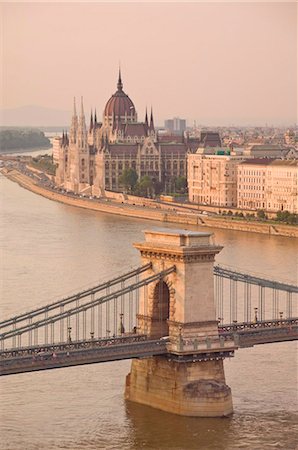 Panorama of city at sunset with neo-gothic Hungarian Parliament building, and the River Danube, UNESCO World Heritage Site, Budapest, Hungary, Europe Stock Photo - Rights-Managed, Code: 841-05782264