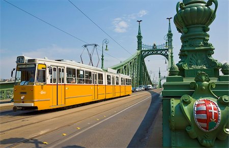 simsearch:841-05846383,k - Yellow tram on The Liberty Bridge (Szabadsag hid), over the Rver Danube, Vamhaz Korut street, Budapest, Hungary, Europe Stock Photo - Rights-Managed, Code: 841-05782275