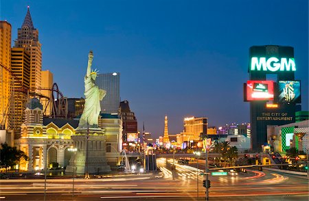 New York-New York hotel with roller coaster, and light trails at night of traffic at the intersection of The Strip, Las Vegas Boulevard South and West Tropicana Avenue, Las Vegas, Nevada, United States of America, North America Stock Photo - Rights-Managed, Code: 841-05782313