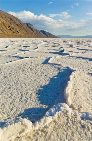 Salt pan polygons at Badwater Basin, 282ft below sea level and the lowest place in North America, Death Valley National Park, California, United States of America, North America Stock Photo - Rights-Managed, Code: 841-05782323