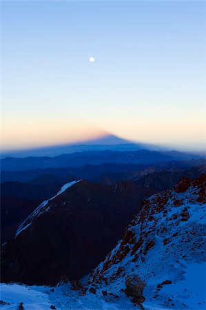 Full moon at sunrise and shadow of Aconcagua 6962m, highest peak in South America, Aconcagua Provincial Park, Andes mountains, Argentina, South America Stock Photo - Rights-Managed, Code: 841-05782775